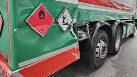 Damaged rear section of a tank truck before repair.